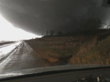 VIDEO: A man in Illinois used his cell phone to capture video of a tornado passing over his truck.