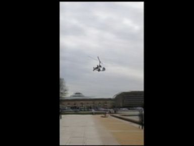 VIDEO: A bystander filmed the one-person helicopter fly over the reflecting pool and land near the U.S. Capitol.