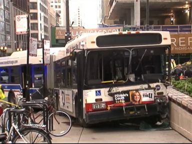 VIDEO: The Chicago Transit Authority bus was turning off a street when it collided with four cars and came to a stop on a pedestrian plaza.