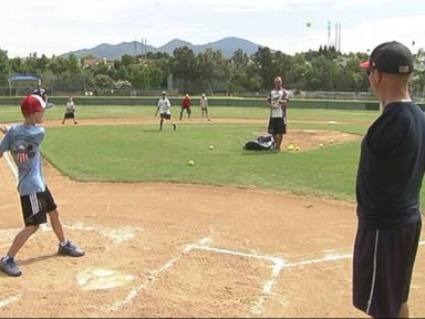 VIDEO: The Wounded Warrior Amputee Softball Team is hosting a week-long camp in California to coach and mentor children who are also missing limbs.