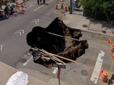 VIDEO: Officials say the sinkhole formed due to a water leak under the road.