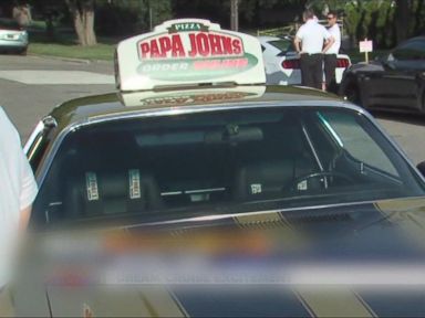 VIDEO: John Schnatter's beloved gold-and-black Camaro, that has been featured in several of the pizza chain's commercials, was stolen during a Detroit classic car show.