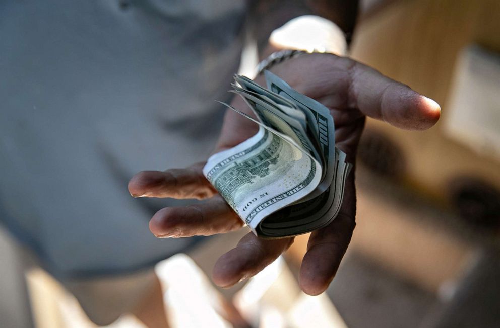 PHOTO: Hector Medrano was able to get a last-minute salary advance to pay his landlord to forestall eviction from an RV park on Oct. 07, 2020, in Phoenix.