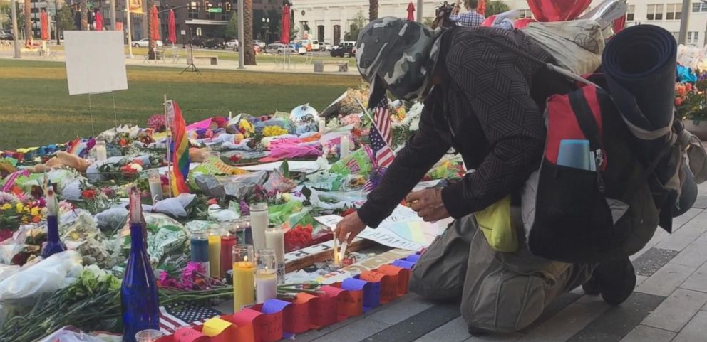 homeless man lights candles for victims of orlando massacre abc news