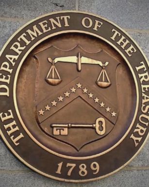 Federal authorities have arrested nearly two dozen people across the United States -- and charged more overseas -- in connection with a far-reaching IRS scam that used fear and intimidation to deceive victims.