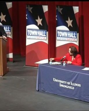 Republican Sen. Mark Kirk appeared to question his Democratic opponent's ties to the United States based on her bi-racial heritage at a debate on Thursday night in Springfield, Illinois.