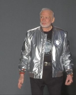 VIDEO: The shiny silver bomber jacket Aldrin donned for designer Nick Graham's show appeared akin to a futuristic spacesuit.