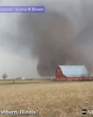 Incredible video shows tornado that touched down in Illinois as severe storms tear through the Midwest.