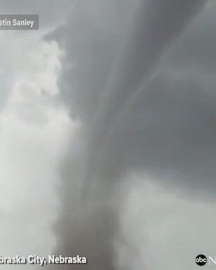 Two Nebraska men capture close-up footage of a tornado right outside Nebraska City: "We're just right under a tornado!"