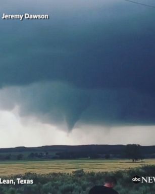 Timelapse footage shows a funnel cloud forming into a tornado in McLean, Texas. 