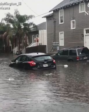 Heavy rains caused flash flooding in New Orleans, Louisiana, submerging cars and swamping streets with rainwater. 