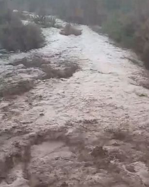 VIDEO: A creek turns into a raging torrent as flash flood warning are issued for portions of the state.