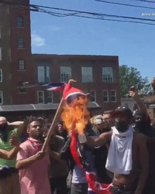 VIDEO: Counterprotesters in Charlottesville, Va., burned a Confederate flag