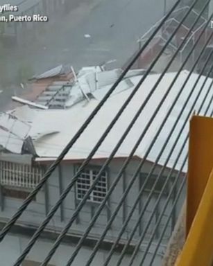 Hurricane Maria bore down on San Juan, Puerto Rico, ripping off buildings' roofs.