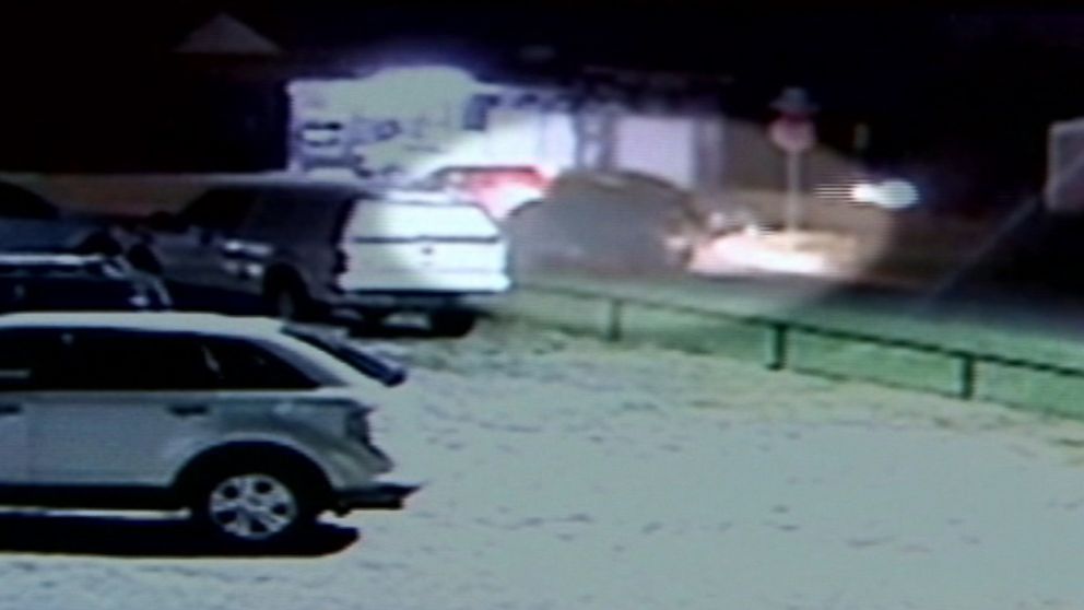 Oklahoma City Police officers pursued the green truck seen in the surveillance recording, leading them to Magdiel Sanchez, who was later shot and killed by authorities.