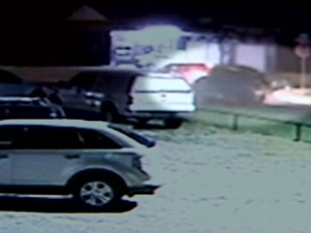 Oklahoma City Police officers pursued the green truck seen in the surveillance recording, leading them to Magdiel Sanchez, who was later shot and killed by authorities.