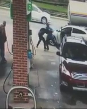 VIDEO: The suspect's attempt to carjack a woman at a Michigan gas station was stopped by a bystander.