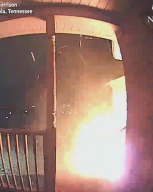 Surveillance video shows the front bushes of Mary Morrison's home in Columbia, Tennessee, bursting into flames early Tuesday.