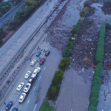 VIDEO: The video of debris and trapped motorists was shot over Montecito, California.