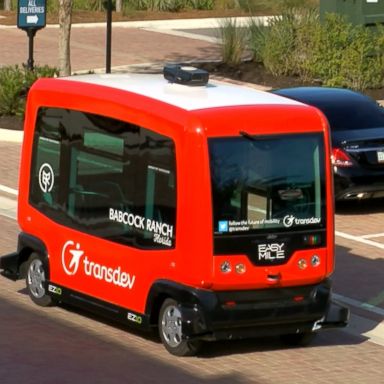 A solar field provides power for the town, including its driverless shuttles.