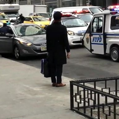 Two 12-year NYPD veterans helped deliver a baby boy on Tuesday morning.