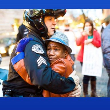 VIDEO: A photo of a tearful Devonte Hart hugging a police officer went viral in 2014.