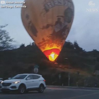 A hot air balloon, with a Scottish gin maker's brand on it, made an unexpected landing on a San Diego hilltop on Sunday. 