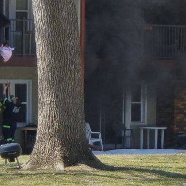 The baby was thrown from a second-story balcony.