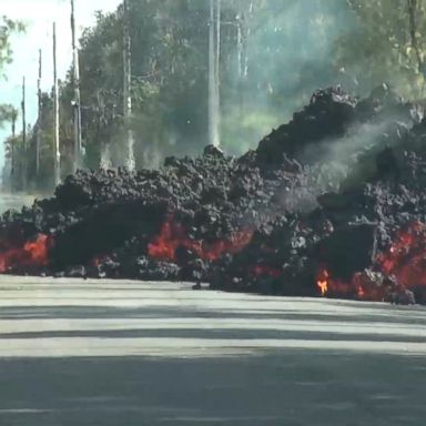 VIDEO: The footage shows lava creep across a road in Hawaii and consume a Ford Mustang.