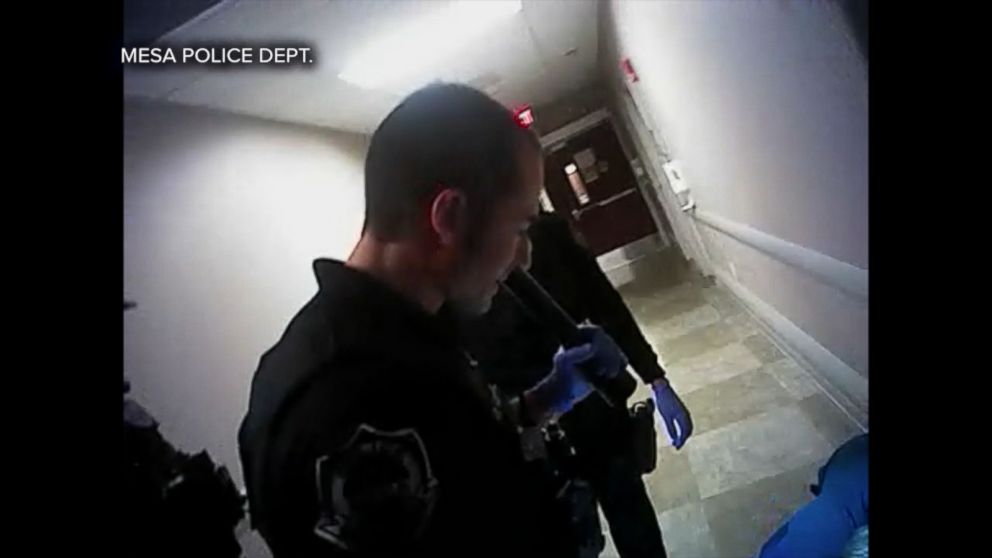 VIDEO: An Arizona police department came under renewed scrutiny this week, after newly-released video appeared to show its officers punching a suspect and mocking him as he lay covered in blood on the floor of a hospital.