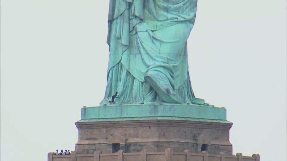 Woman Climbs The Statue Of Liberty Island Being Evacuated Video Abc News