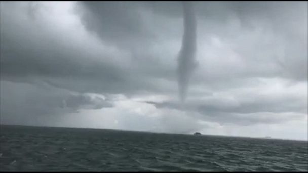 Video Boater finds shelter from waterspout under stilt house - ABC News