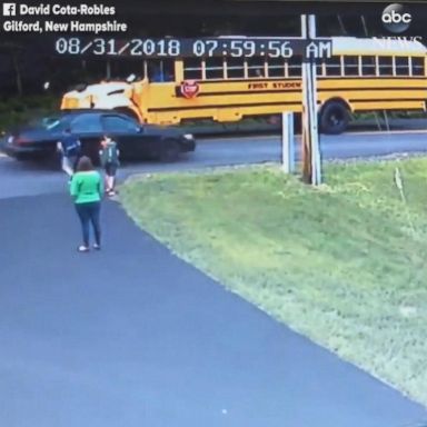 VIDEO: Car almost hits boy walking to school bus