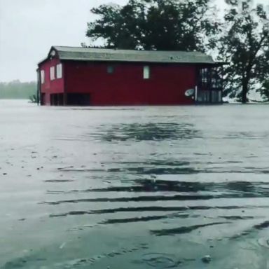 Residents returned to review damage of a house and dock along the Pamlico River.