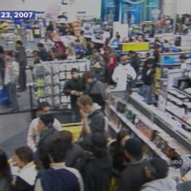 Crowds battle for bargains on Black Friday.