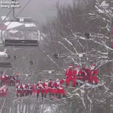 VIDEO: Hundreds of Santas traded their sleighs for skis and snowboards for the annual "Santa Sunday" in Maine, raising $4,000 for local charities.