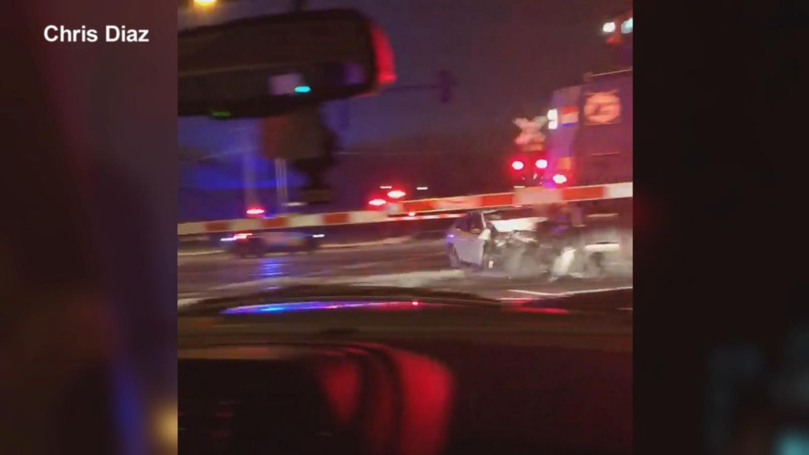 Police, bystanders rescue woman stuck on tracks just before train ...