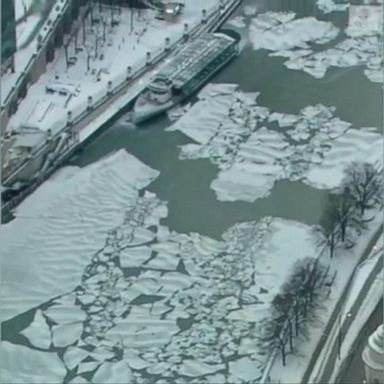 VIDEO: Aerial footage shows the view of the Chicago River as the city experiences brutally cold temperatures--and could see a wind chill of 50 below zero on Wednesday.