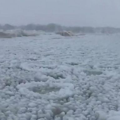 VIDEO: A layer of ice sits atop Lake Michigan and nearby St. Joseph River as brutally cold and extremely dangerous below-zero wind chills paralyze the Midwest.