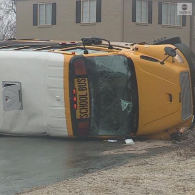 VIDEO: School bus overturns on icy road