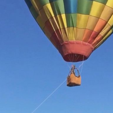 VIDEO: Stronger than normal winds forced hot air balloon pilot Brian Lynch to make an emergency landing in Murrieta, California.