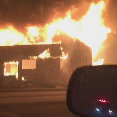 VIDEO: Brian Andrews, a 52-year-old retired firefighter, captured video of the fiery destruction while driving from his home.