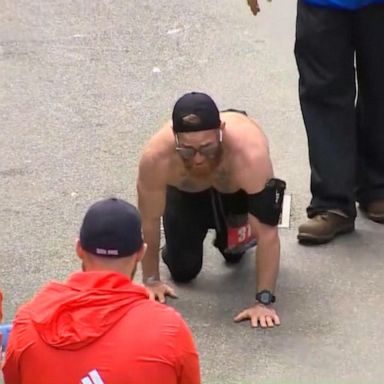 VIDEO: Veteran crawls across finish line of Boston Marathon