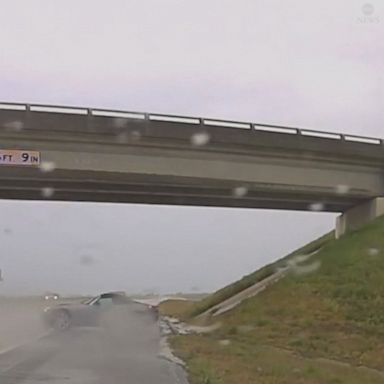 Oklahoma Highway Patrol car captured the terrifying moment a passing car hydroplaned and spun off the highway amid rainy conditions.