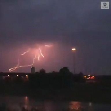 Arcs of lightning create a dazzling display, lighting up the dark skies over Houston as severe storms rolled through the area bringing torrential rainfall.