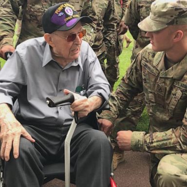 Leonard Jindra and Hal Baumgarten, the widow of the soldier who inspired the opening scene of "Saving Private Ryan," visited the Normandy American Cemetery. 