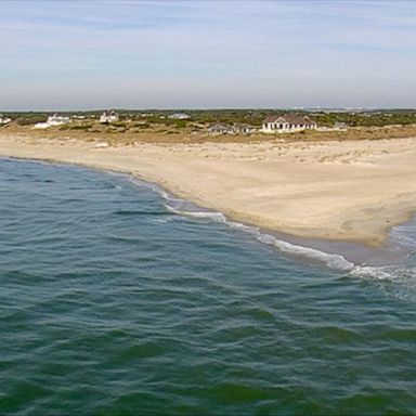 An 8-year-old boy was attacked by a shark while swimming off the North Carolina coast on Sunday afternoon, officials said.