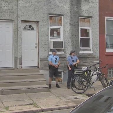 Neighbors say they heard an explosion and screams coming from the child's Philadelphia home.