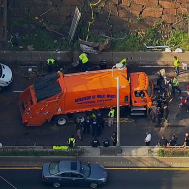 PHOTO: Garbage truck turned upright after crashing near NYC's Lincoln Tunnel 