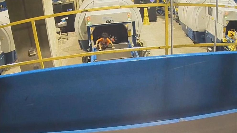Toddler takes ride on airport luggage conveyor belt GMA